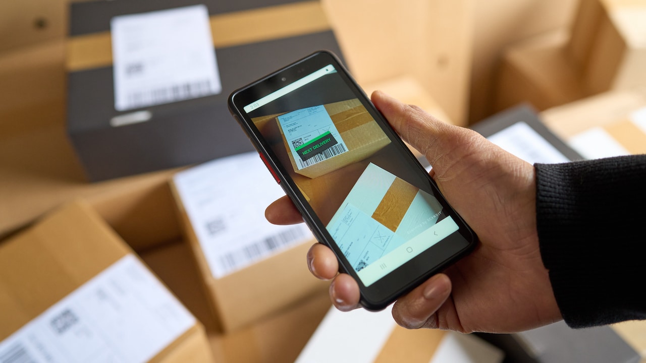 User searching a specific parcel using multiple barcode scanning technology