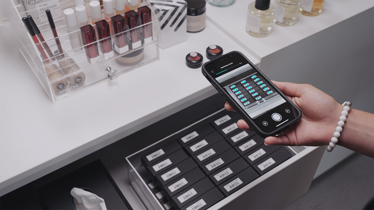 Scandit MatrixScan Count being used for efficient cycle counting in a make-up store.